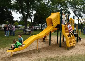 kids-playing-on-a-yellow-playground